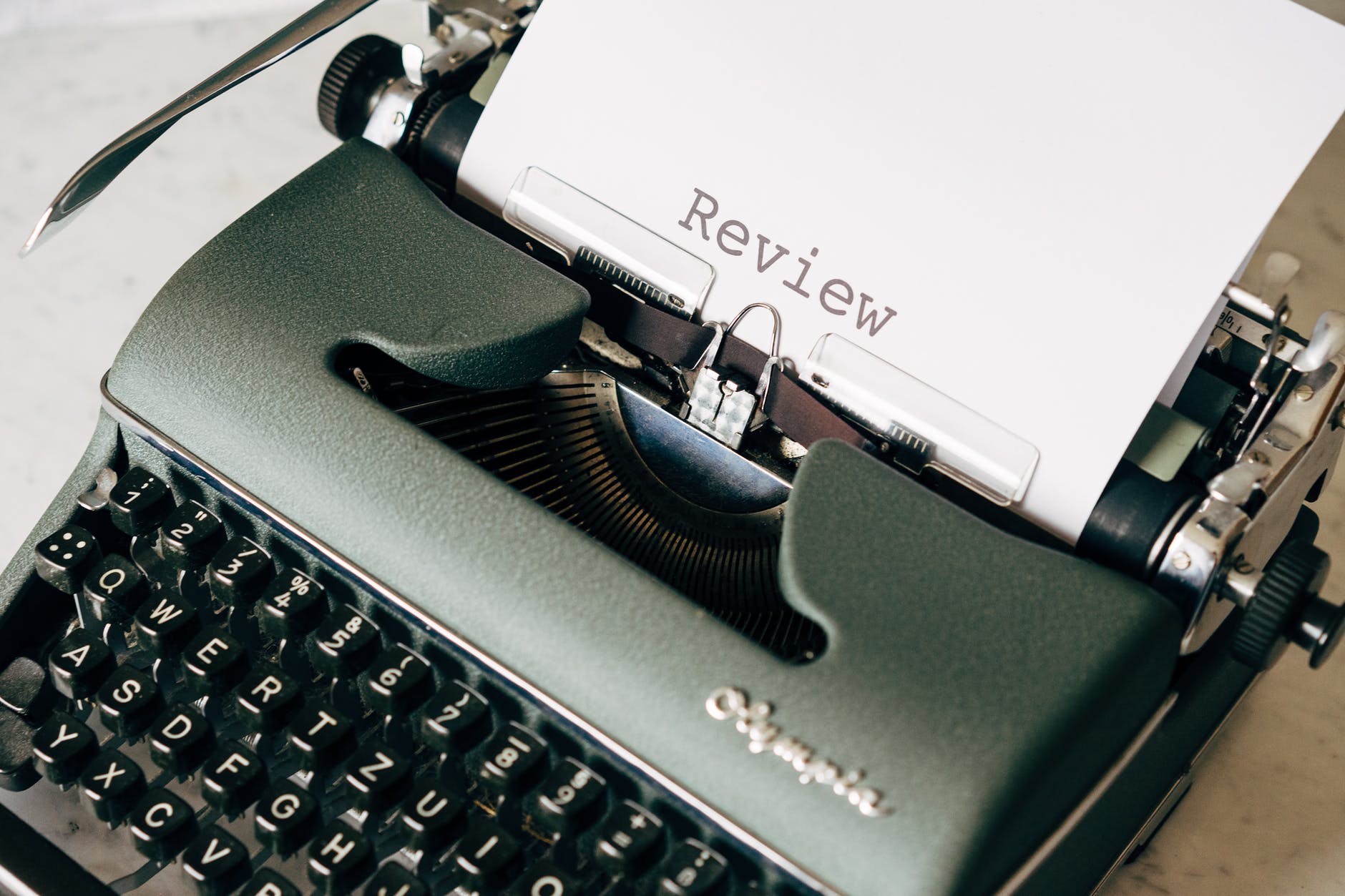 black and white typewriter on table