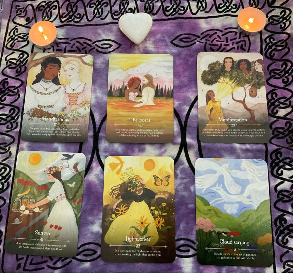 Beltane to Litha six card oracle spread using seasons of the witch oracles.