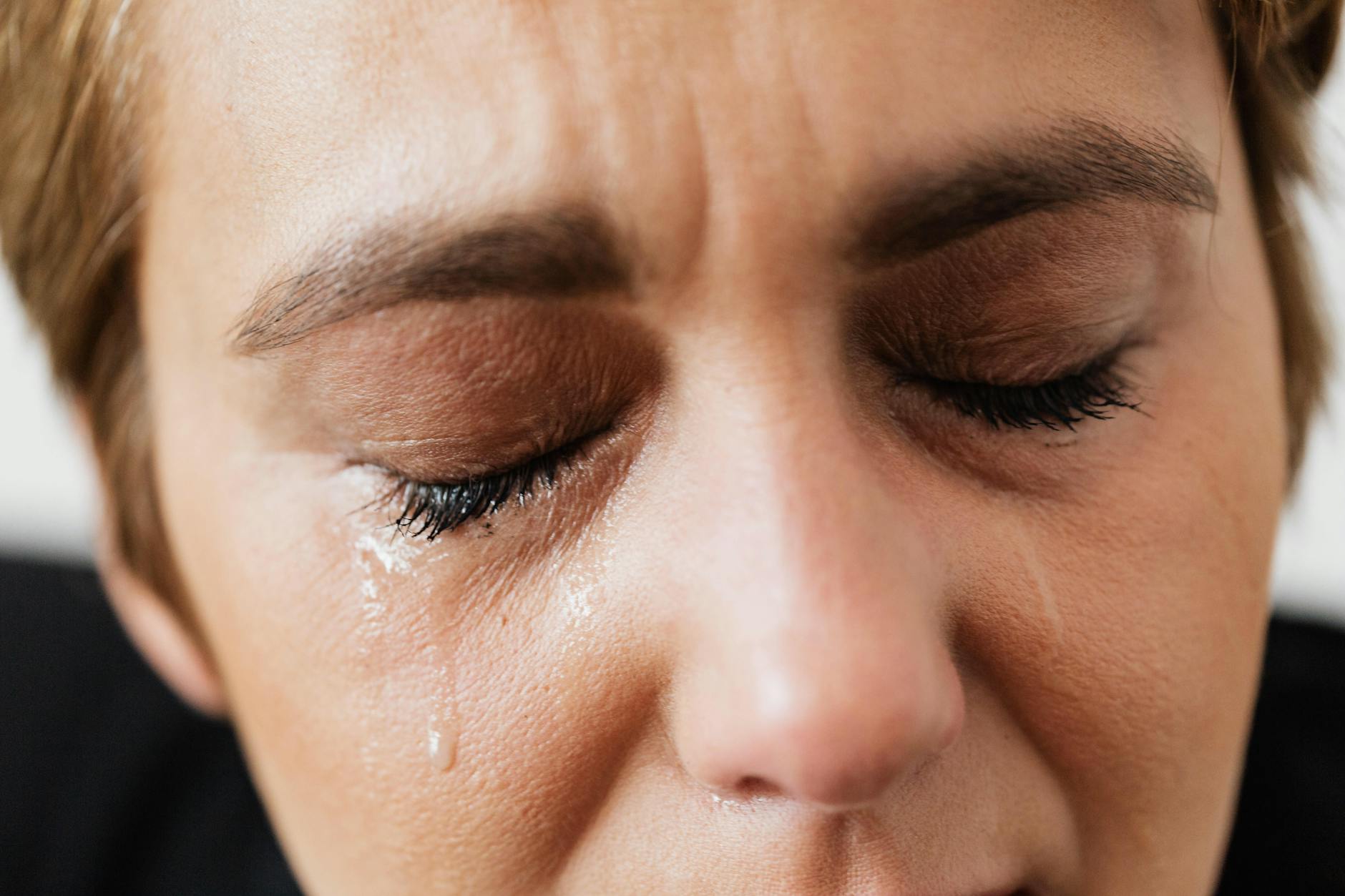 tears on face of crop anonymous woman tricks to feel better