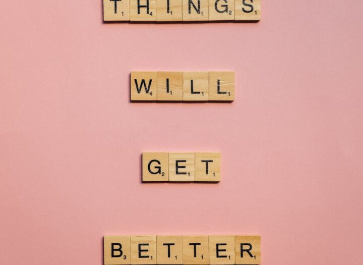 wooden scrabble tiles with message