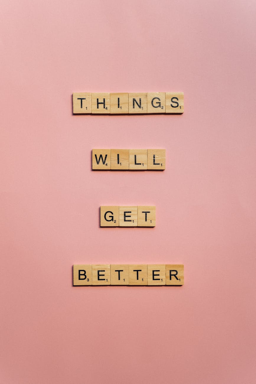 wooden scrabble tiles with message